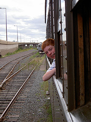 Henry hanging out of train window